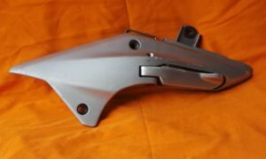 Platine et repose pied arrière gauche HONDA Silver Wing