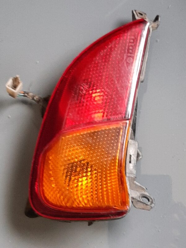 Clignotant et feu arrière gauche de HONDA 125 Panthéon
